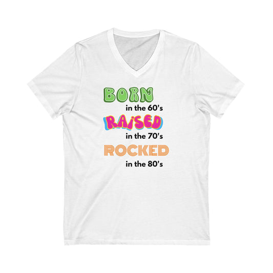 Born in the 60's Unisex Short Sleeve V-Neck Tee Light shirt design Multi & Black lettering